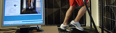 man running on treadmill with video gait analysis
